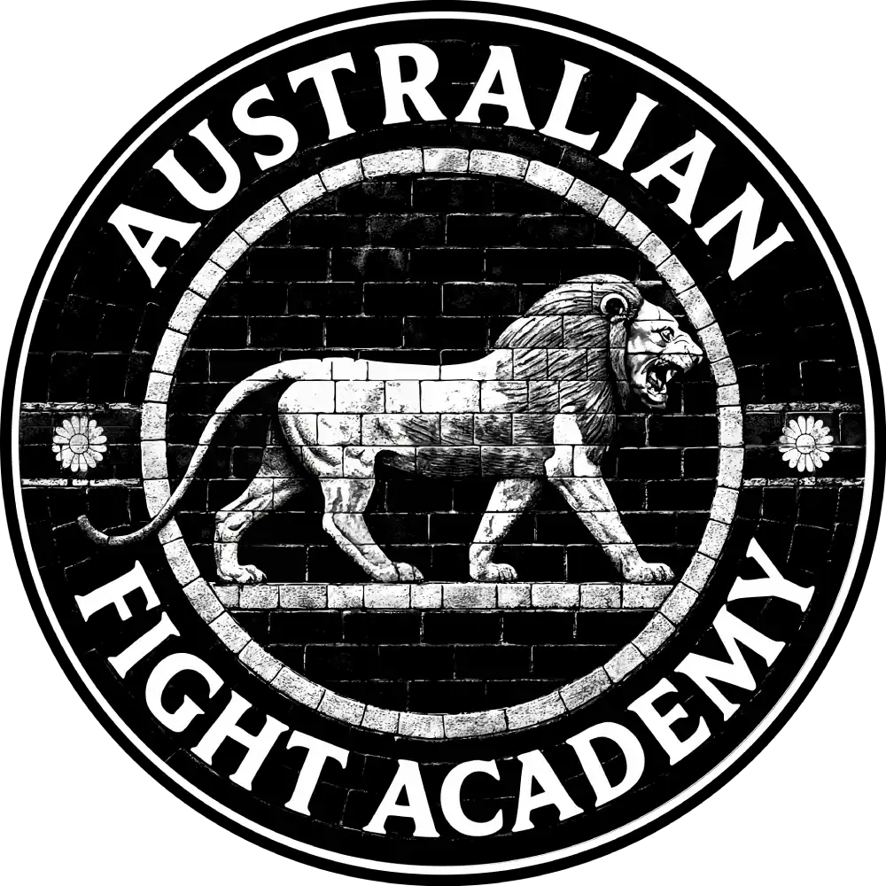 Circular logo with a roaring lion standing on all fours in the center, surrounded by the words AUSTRALIAN FIGHT ACADEMY in bold letters on a brick-patterned background.